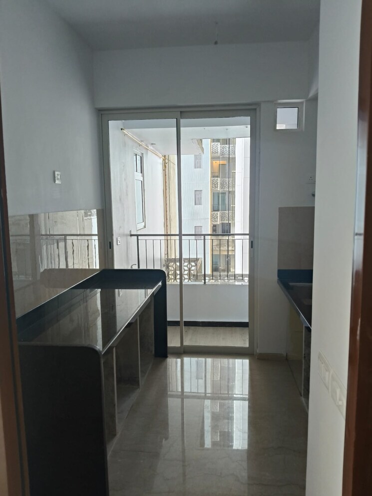 Kitchen, courtyard-by-narang-realty-and-the-wadhwa-group 2 Bedroom 830 Sq.Ft. Apartment In Pokhran Road No Two Thane 9156694