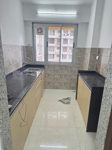 Kitchen in 1 BHK Apartment at Sheth Vasant Oasis, Andheri East – for Rent