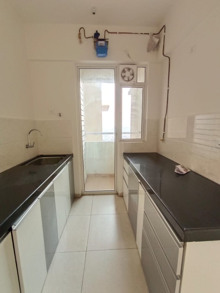 Kitchen, mahindra-centralis-tower-1 2 Bedroom 594 Sq.Ft. Apartment In Pimpri Pune 9156766