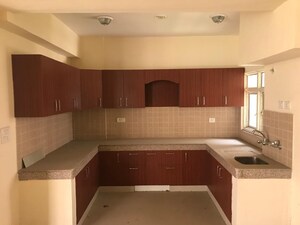 Kitchen in 3 BHK Apartment at Supertech Czar Suites, Omicron I Greater Noida – for Sale