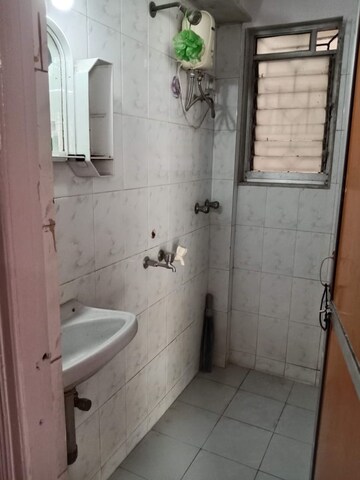 Bathroom in 1 BHK Apartment at Kopar Khairane – for Rent