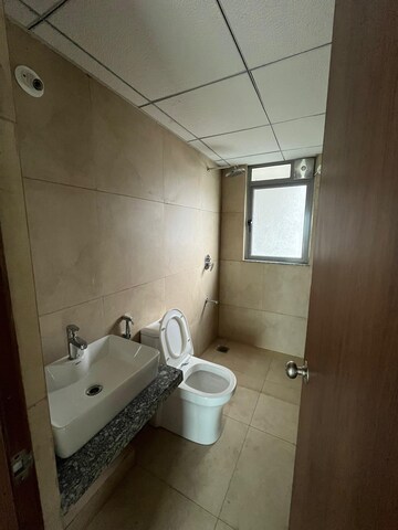 Bathroom in 2 BHK Apartment at Sudarshan Sky Garden, Ghodbunder Road – for Rent