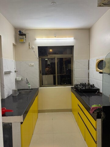 Kitchen in 2 BHK Apartment at Godrej Emerald, Ghodbunder Road – for Rent