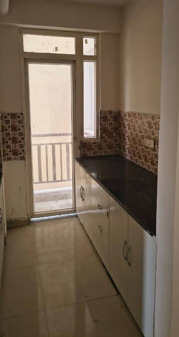 Kitchen in 2 BHK Apartment at Aims Greens Avenue, Sector 4 Greater Noida – for Rent