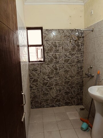 Bathroom in 2 BHK Builder Floor at Shri Devaji Residency, Dhakoli – for Sale