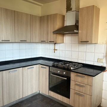 Kitchen in 3 BHK Apartment at Unitech Escape, Rosewood City – for Rent