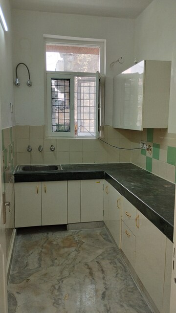 Kitchen in 3 BHK Builder Floor at Green Fields Colony – for Sale