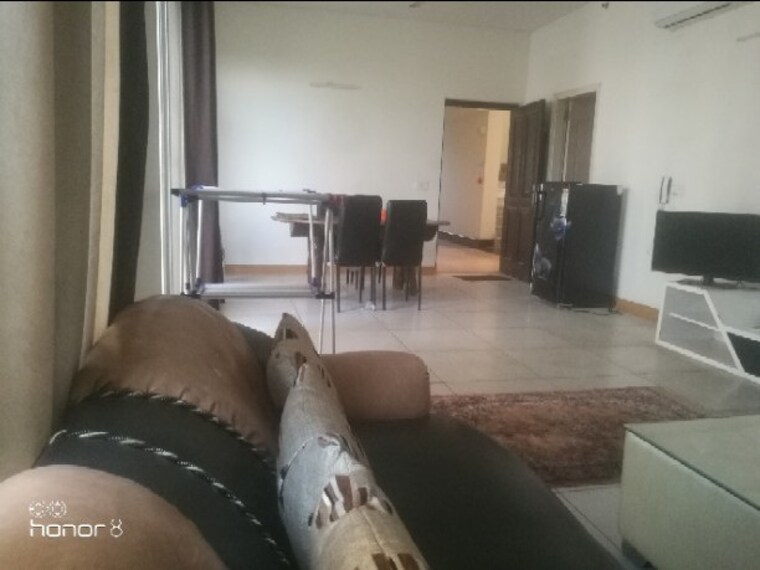 Living Room, jaypee-greens-star-court 2 Bedroom 1698 Sq.Ft. Apartment In Jaypee Greens Greater Noida 9157711