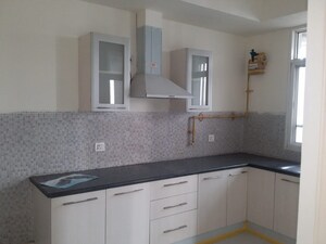 Kitchen in 4 BHK Apartment at Jaypee Greens Sun Court III, Jaypee Greens – for Sale