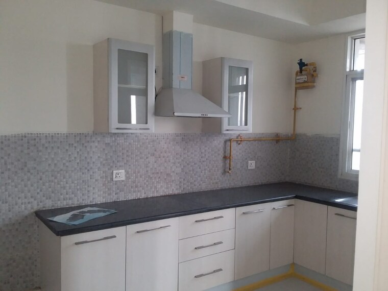 Kitchen, jaypee-greens-sun-court-iii 4 Bedroom 3850 Sq.Ft. Apartment In Jaypee Greens Greater Noida 9157746