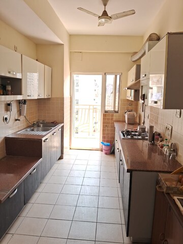 Kitchen in 3 BHK Apartment at Antriksh Golf View, Sector 78 – for Rent