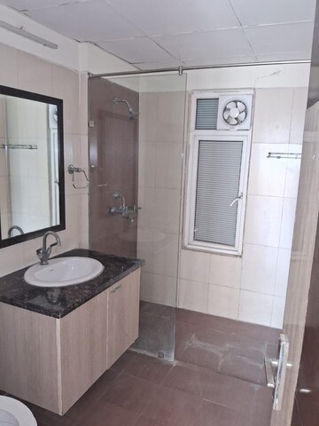 Bathroom in 3 BHK Apartment at Antriksh Golf View, Sector 78 – for Rent