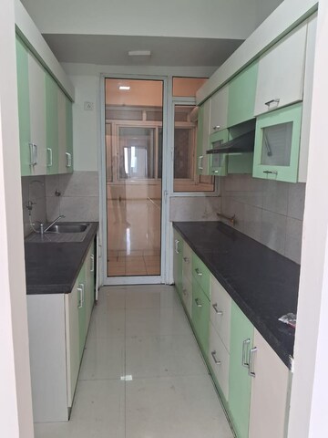 Kitchen in 3 BHK Apartment at Mahagun Moderne, Sector 78 – for Rent