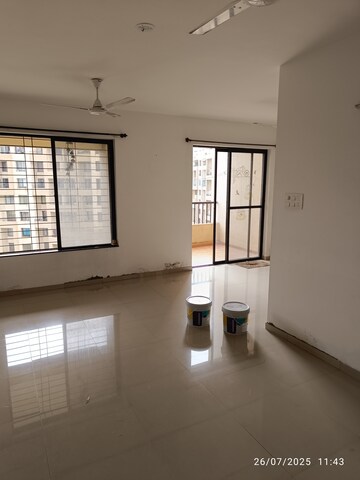 Living Room in 2 BHK Apartment at Kolte Patil Margosa Heights, Mohammadwadi – for Rent