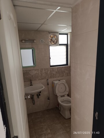 Bathroom in 2 BHK Apartment at Kolte Patil Margosa Heights, Mohammadwadi – for Rent