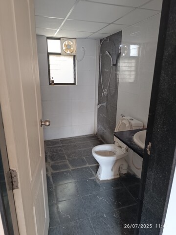 Bathroom in 2 BHK Apartment at Kolte Patil Margosa Heights, Mohammadwadi – for Rent