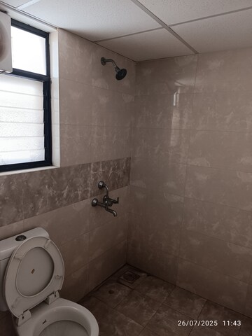 Bathroom in 2 BHK Apartment at Kolte Patil Margosa Heights, Mohammadwadi – for Rent