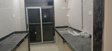 Bathroom in 3 BHK Apartment at Riddhi Tower, Malad East – for Rent
