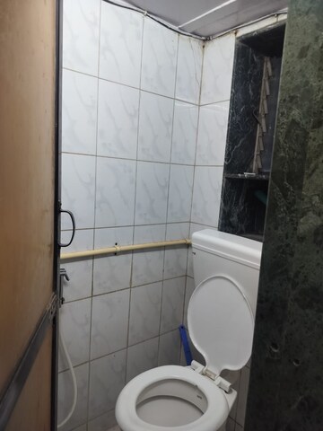 Bathroom in 1 BHK Apartment at Omkar Sai CHS, Lower Parel – for Rent