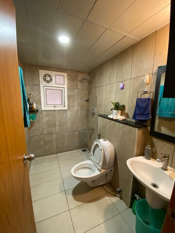 Bathroom in 1 BHK Apartment at Prestige Song Of The South, Yelenahalli – for Rent