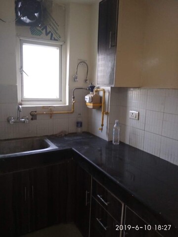 Kitchen in 1 BHK Apartment at Aditya Celebrity Homes, Sector 76 – for Rent