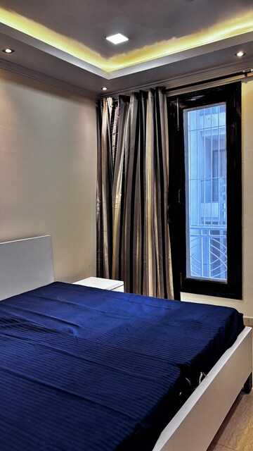 Bedroom in 4 BHK Builder Floor at Greater Kailash I – for Rent