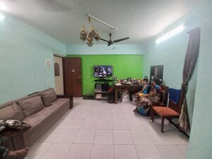 Living Room in 2 BHK Apartment at Shaligram CHS, Azad Nagar – for Sale