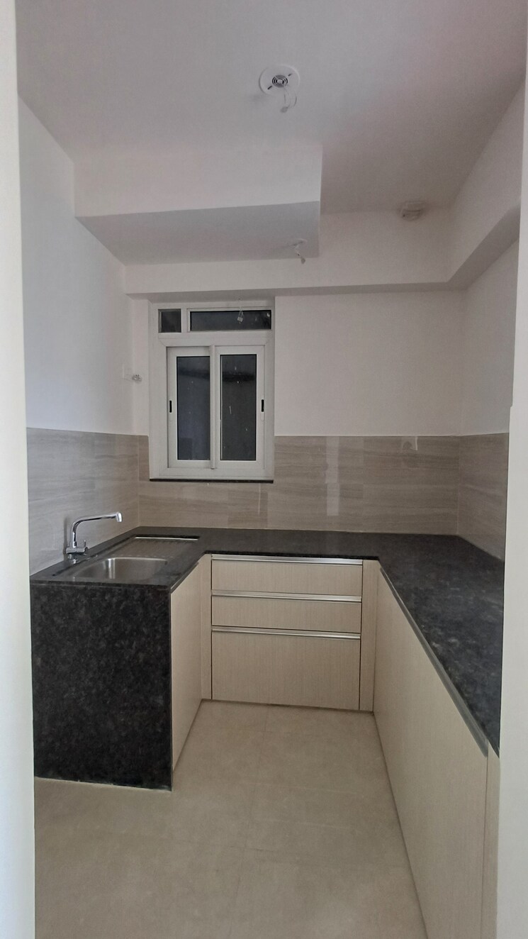Kitchen, courtyard-by-narang-realty-and-the-wadhwa-group 2 Bedroom 840 Sq.Ft. Apartment In Pokhran Road No Two Thane 9159474
