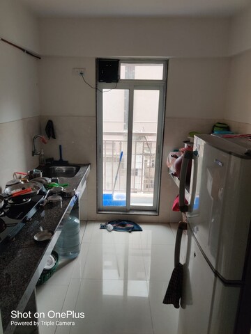 Kitchen in 1 BHK Apartment at Metropolis Aquaris Phase 2, Kasarvadavali – for Rent