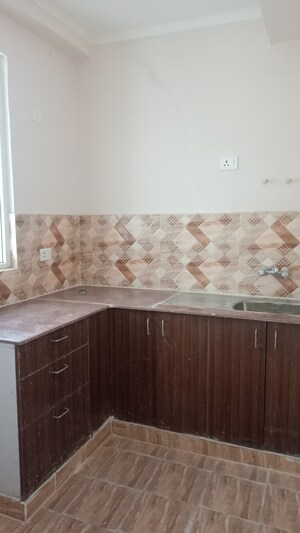 Kitchen in 2 BHK Apartment at Amrapali Golf Homes, Sector 4 Greater Noida – for Sale