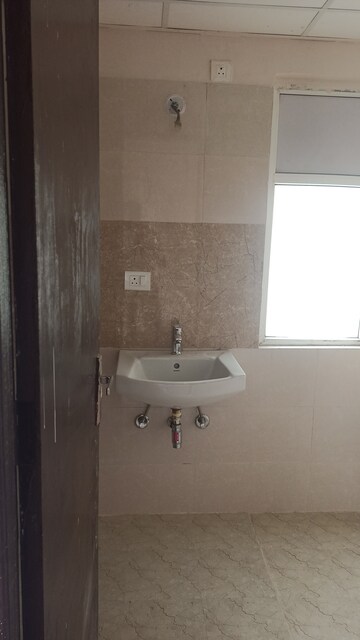 Bathroom in 2 BHK Apartment at Amrapali Golf Homes, Sector 4 Greater Noida – for Sale