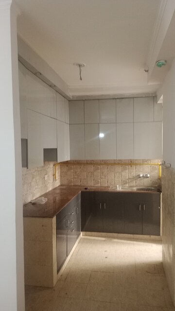 Kitchen in 3 BHK Apartment at Amrapali Golf Homes, Sector 4 Greater Noida – for Rent