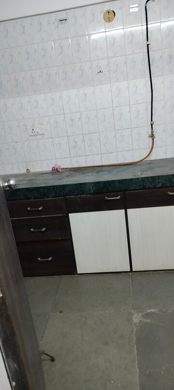 Kitchen in 2 BHK Apartment at Sumeru CHS, Andheri West – for Rent