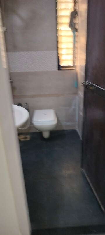 Bathroom in 2 BHK Apartment at Sumeru CHS, Andheri West – for Rent