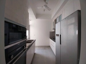 Kitchen in 3.5 BHK Apartment at DLF The Ultima, Sector 81 – for Sale