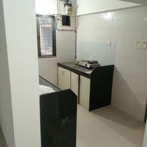 Kitchen in 1 BHK Apartment at Sethia Green View, Goregaon West – for Sale