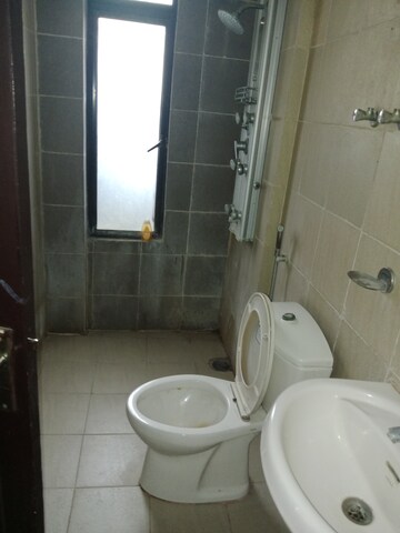 Bathroom in 2.5 BHK Apartment at Ajnara Integrity, Raj Nagar Extension – for Rent
