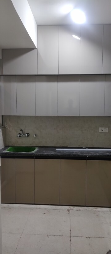 Kitchen in 2 BHK Apartment at Signature The Millennia 2, Sector 37d – for Rent