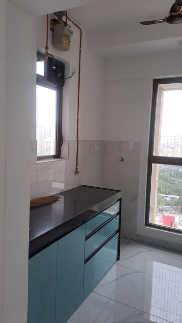 Kitchen in 1 BHK Apartment at Raymond Realty Phase II, Pokhran Road No Two – for Rent