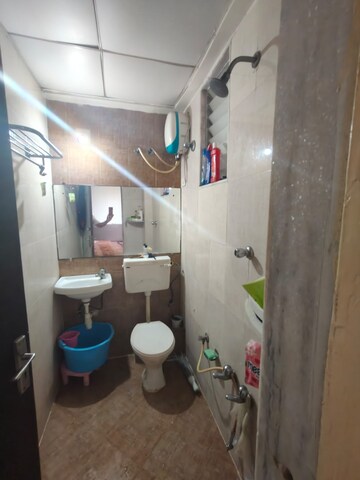 Bathroom in 2 BHK Apartment at Sahaj Solarium, Vasna – for Rent