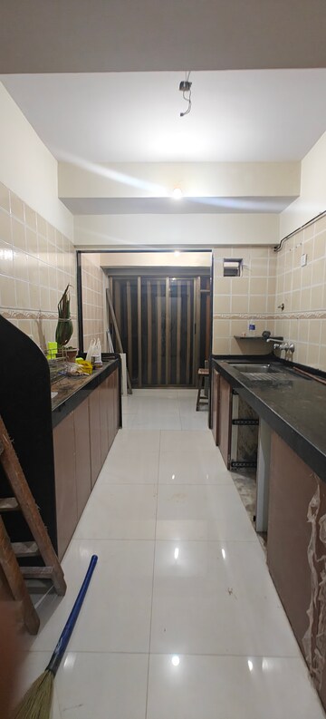 Kitchen in 2 BHK Apartment at Aditya Vardhan Apartment, Powai – for Rent