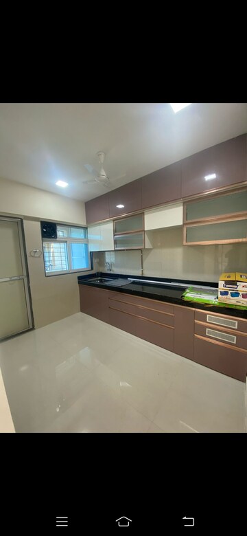 Kitchen in 2 BHK Apartment at Cosmos Habitat, Majiwada – for Rent