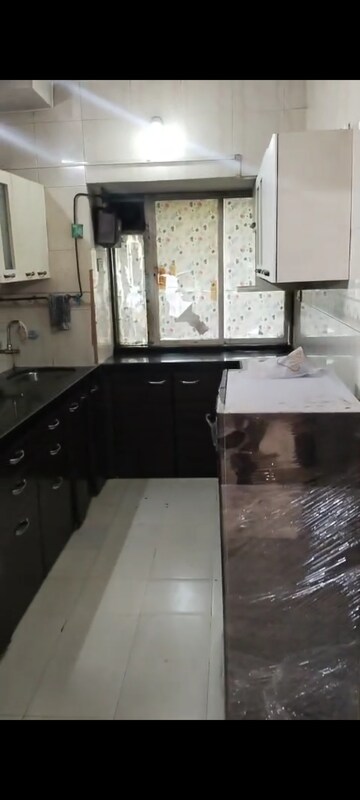 Kitchen in 2 BHK Apartment at Datta Tower, Parel – for Rent