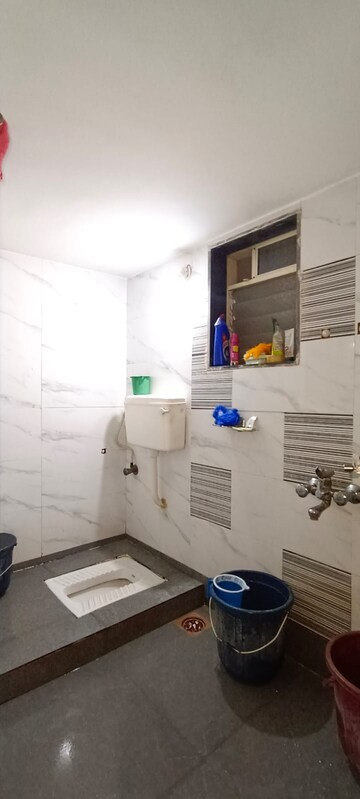 Bathroom in 2 BHK Apartment at Shiv Shakti Shree Yashwant Empire, Nalasopara East – for Rent
