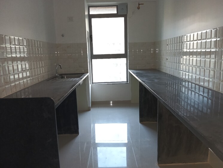 Kitchen, kalpataru-immensa 2 Bedroom 808 Sq.Ft. Apartment In Kolshet Road Thane 9160144