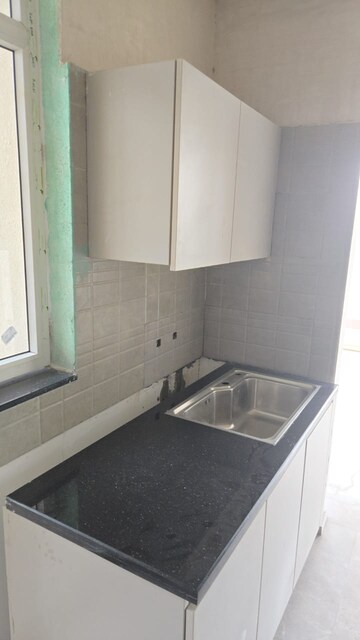 Kitchen in 3 BHK Apartment at Ace Starlit, Sector 152 – for Rent