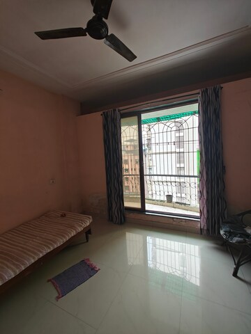 Living Room in 2 BHK Apartment at Padmashri CHS , Seawoods – for Rent