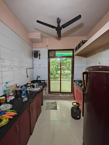 Kitchen in 2 BHK Apartment at Padmashri CHS , Seawoods – for Rent