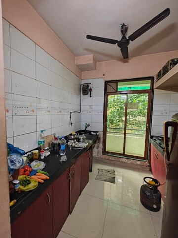 Kitchen in 2 BHK Apartment at Padmashri CHS , Seawoods – for Rent