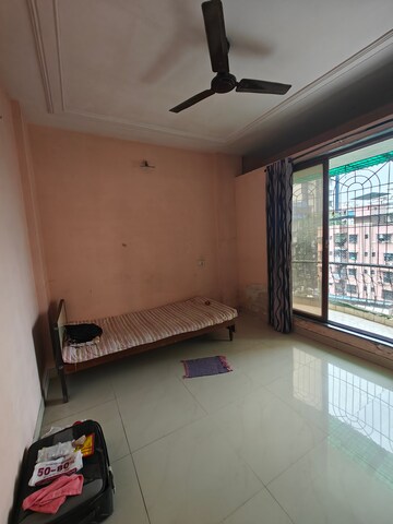 Bedroom in 2 BHK Apartment at Padmashri CHS , Seawoods – for Rent